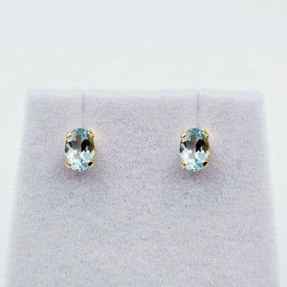 14K Yellow Gold Oval Genuine Aquamarine 6X4mm Stud Earrings