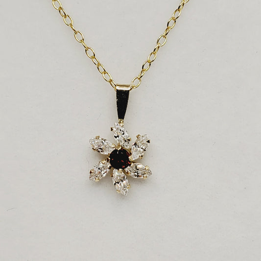 Garnet Starburst Pendant | 10K Yellow Gold Garnet and Cubic Zirconia Pendant
