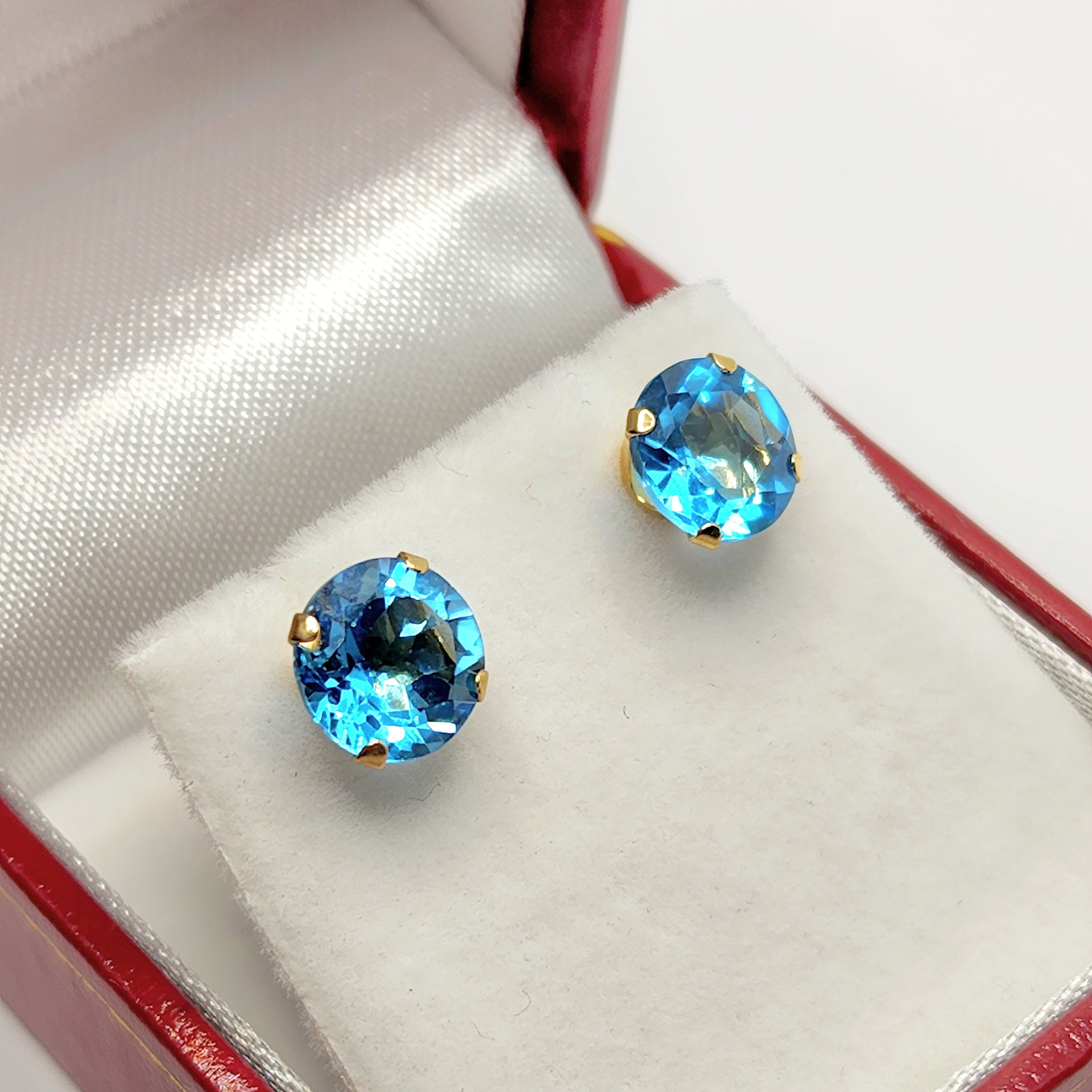 10K Yellow Gold Blue Topaz 7x7mm Stud Earrings: December Birthstone