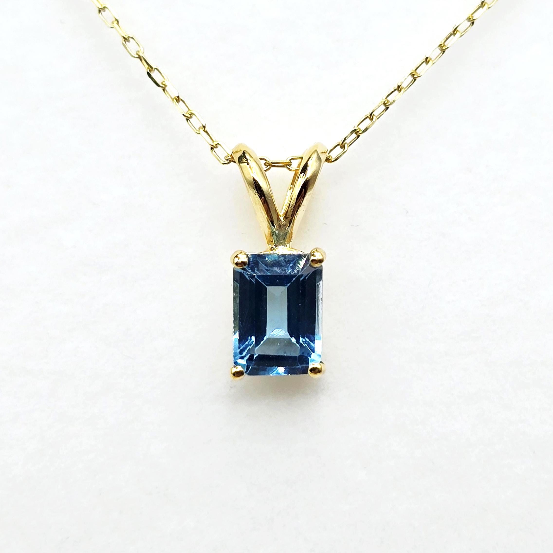 14K Gold Emerald Cut Blue Topaz Pendant Necklace, December Birthstone 7x5mm