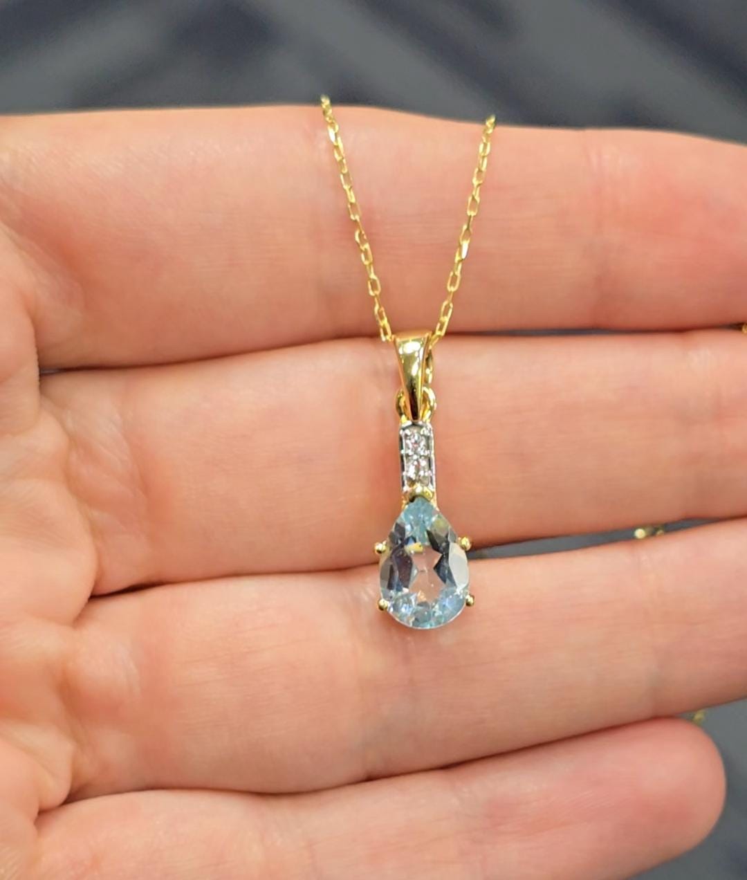 Gold-Plated Sterling Silver Blue Topaz Pear Pendant, CZ Accents