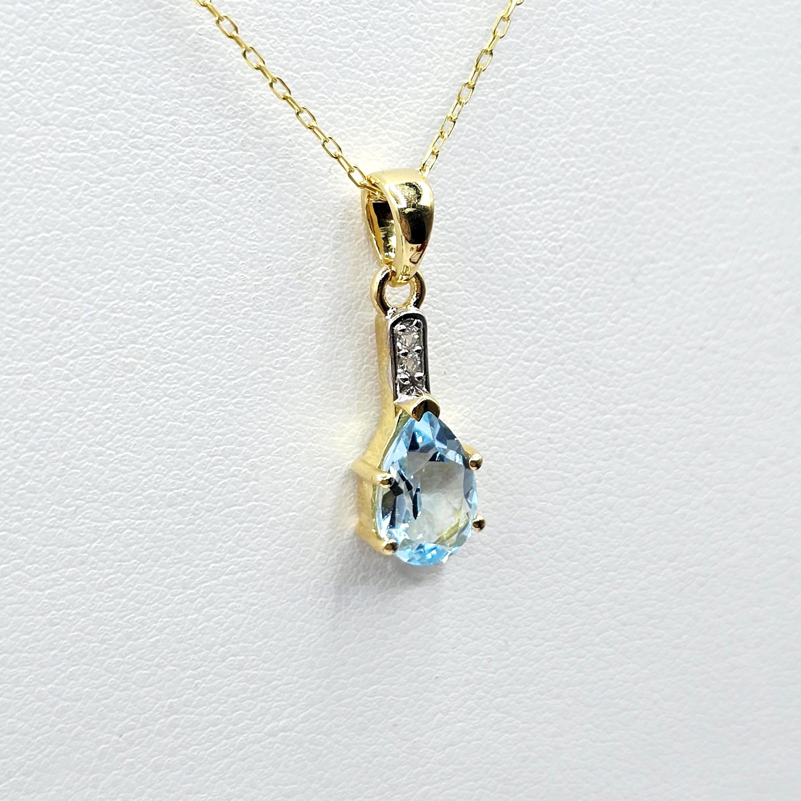 Gold-Plated Sterling Silver Blue Topaz Pear Pendant, CZ Accents