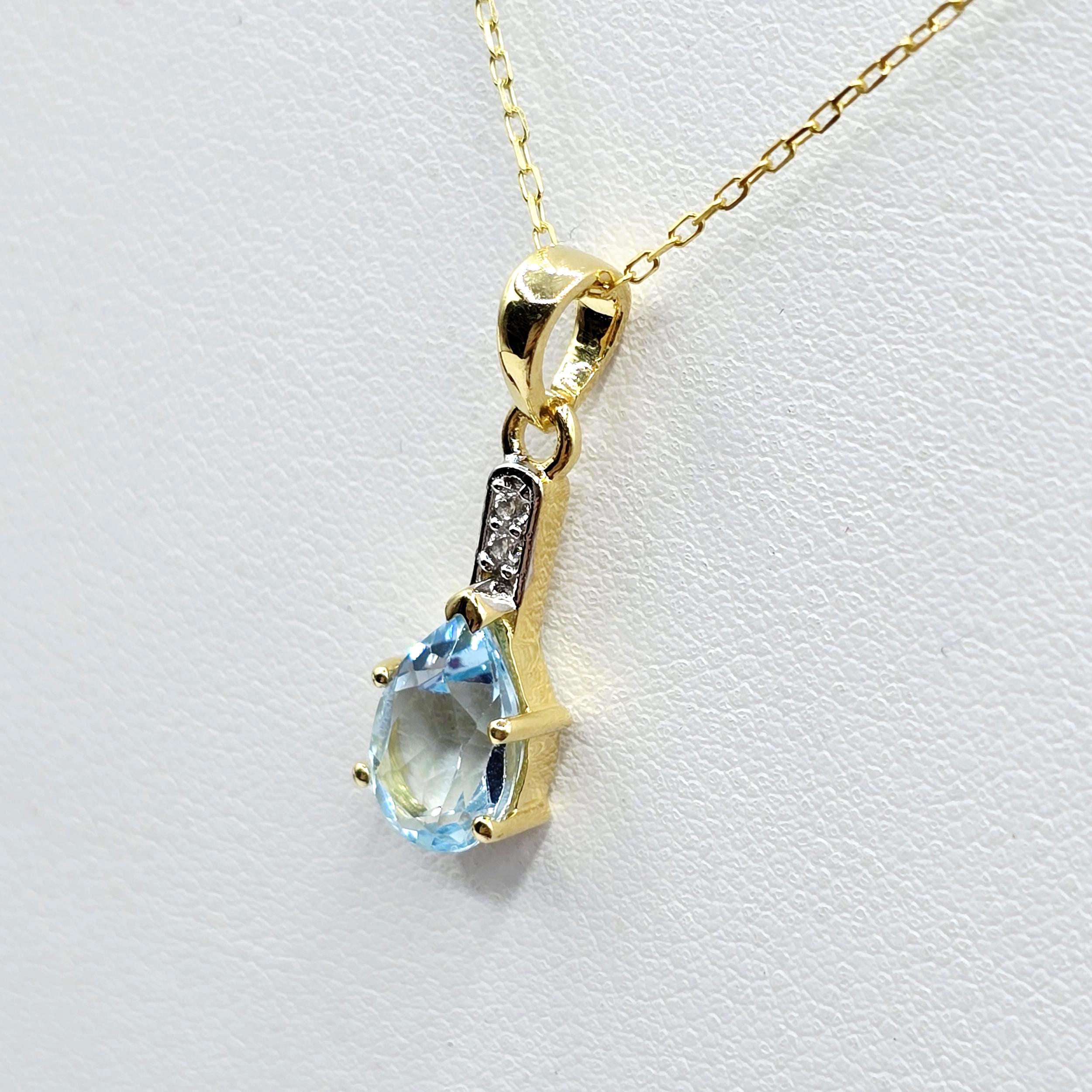Gold-Plated Sterling Silver Blue Topaz Pear Pendant, CZ Accents