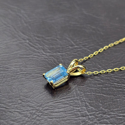 14K Gold Emerald Cut Blue Topaz Pendant Necklace, December Birthstone 7x5mm