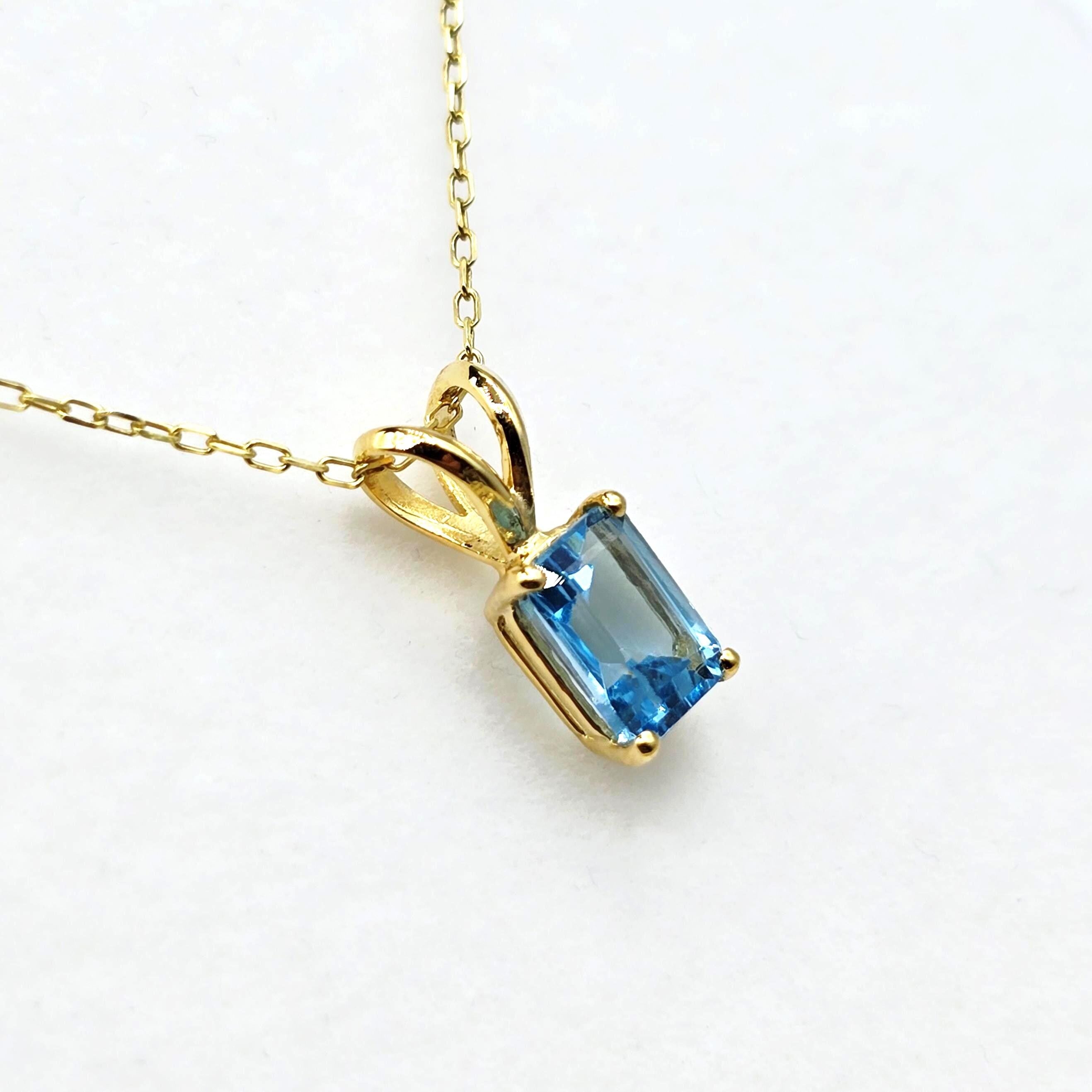 14K Gold Emerald Cut Blue Topaz Pendant Necklace, December Birthstone 7x5mm
