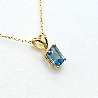 14K Gold Emerald Cut Blue Topaz Pendant Necklace, December Birthstone 7x5mm
