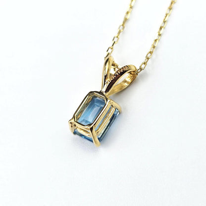 14K Gold Emerald Cut Blue Topaz Pendant Necklace, December Birthstone 7x5mm