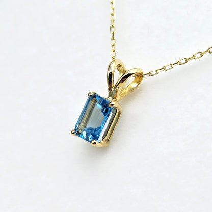 14K Gold Emerald Cut Blue Topaz Pendant Necklace, December Birthstone 7x5mm