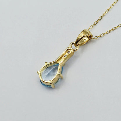 Gold-Plated Sterling Silver Blue Topaz Pear Pendant, CZ Accents