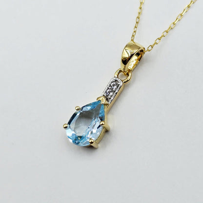 Gold-Plated Sterling Silver Blue Topaz Pear Pendant, CZ Accents