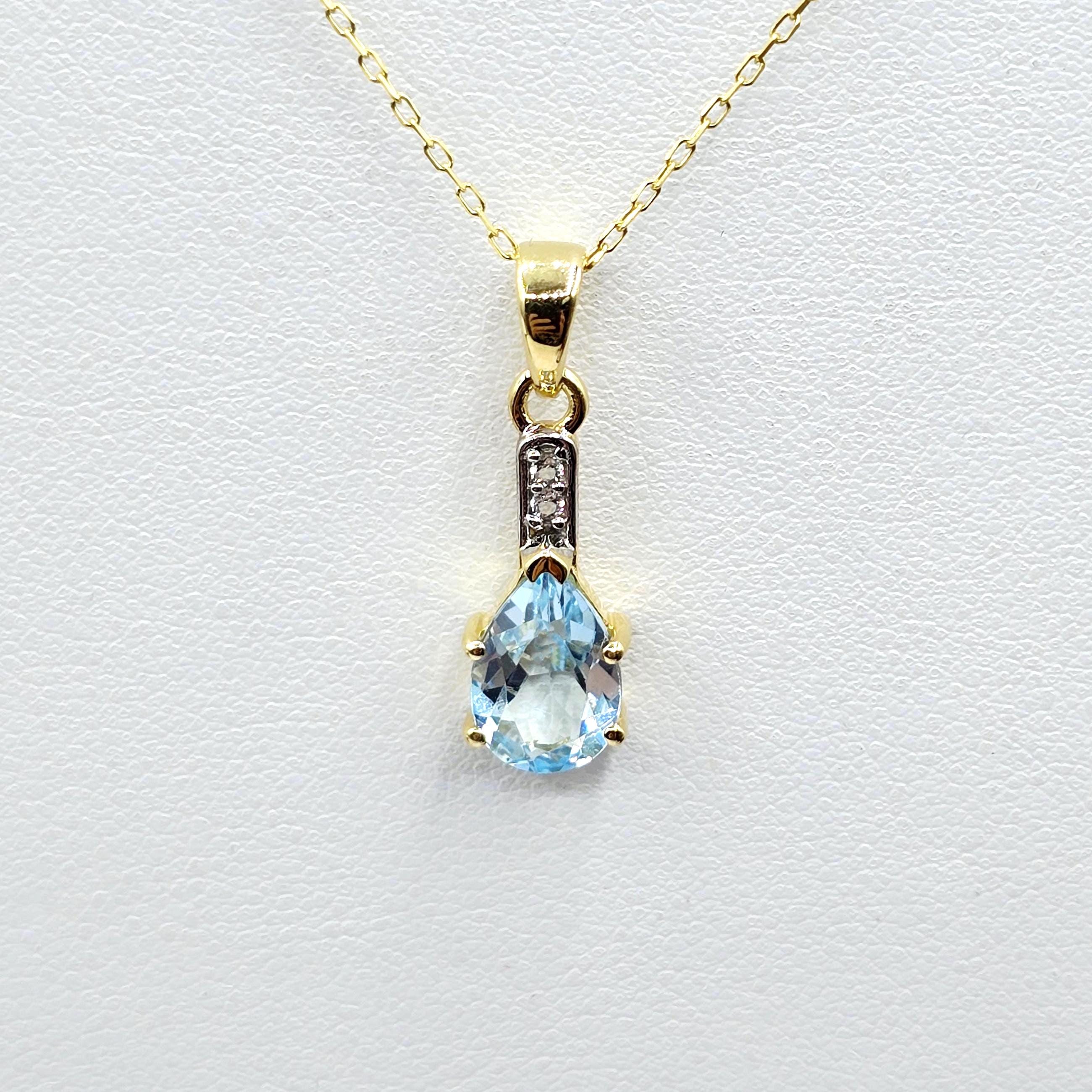 Gold-Plated Sterling Silver Blue Topaz Pear Pendant, CZ Accents