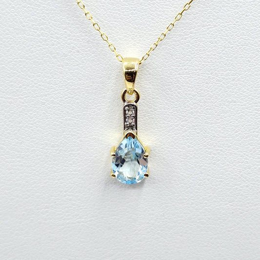 Gold-Plated Sterling Silver Blue Topaz Pear Pendant, CZ Accents